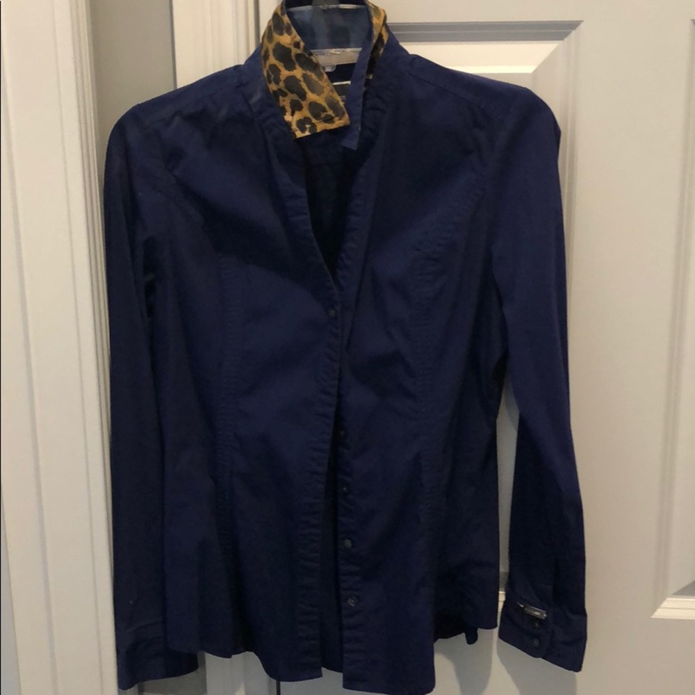 Express the essential shirt button down blouse.